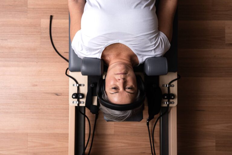 Woman stretching on a Reformer